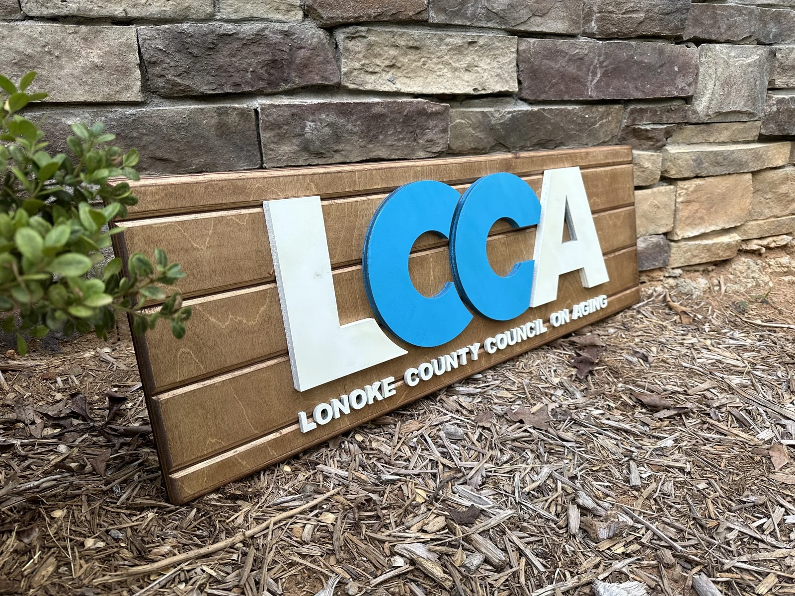 Angled view of the layered LCCA sign